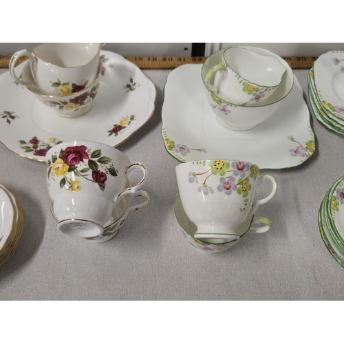 403 - 2 tea sets to include Crown Essex 'Richmond rose' 21 piece & 20 piece Delphine China.