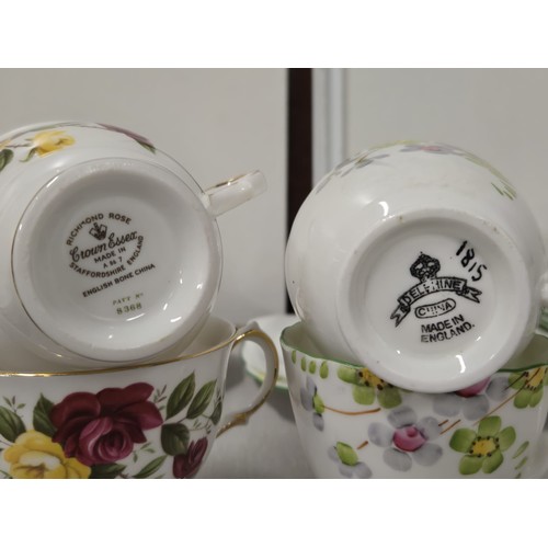 403 - 2 tea sets to include Crown Essex 'Richmond rose' 21 piece & 20 piece Delphine China.