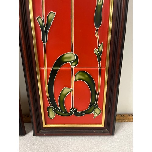 449 - Pair of framed Victorian fireside tiles depicting yellow flower against red background. 33