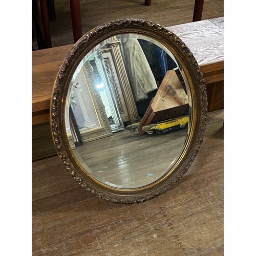 593 - Vintage A W Morris gilt framed oval mirror 27 x 23 inches