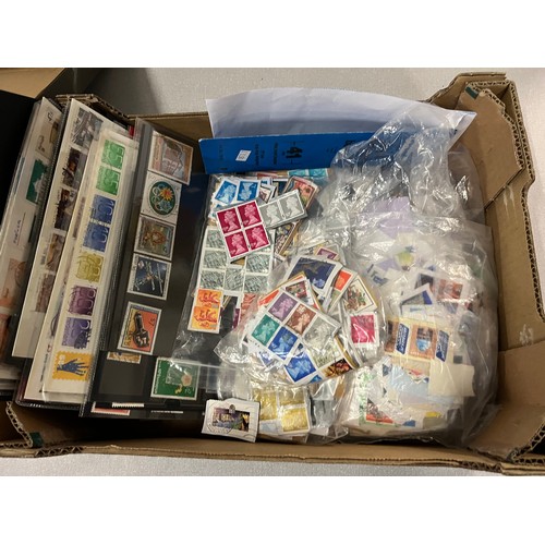 406 - 2 Boxes of loose stamps.