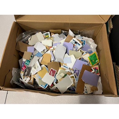 406 - 2 Boxes of loose stamps.