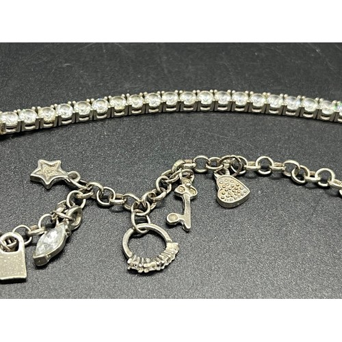 53 - 2 silver bracelets