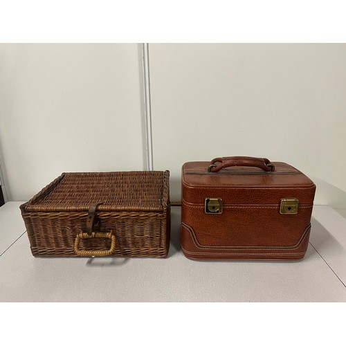 283 - Vintage wicker basket along with leather vanity case.