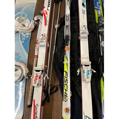 458 - Selection of skis and snowboard to include Fischer, Snowbird Blizzard etc.