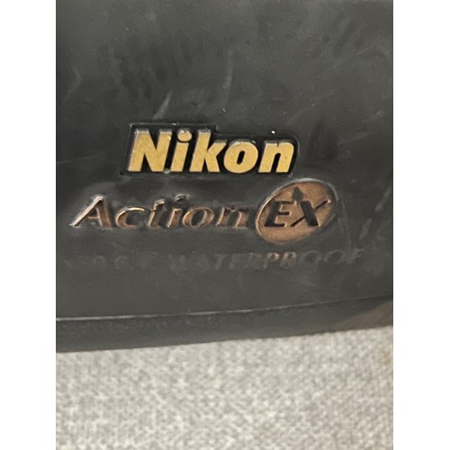 215 - A pair of waterproof nikon action 7 x 50 binoculars & bag