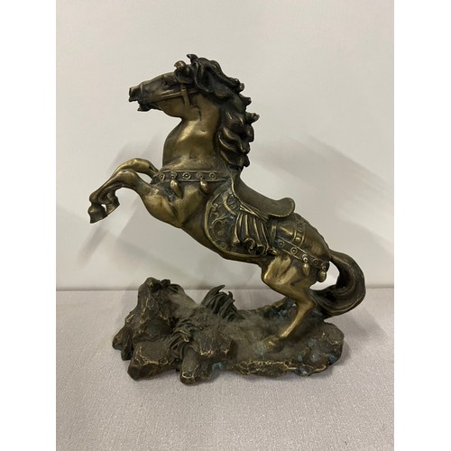 43 - Heavy antique Tibetan silver sculpture of prancing horse. 3.95kg 12