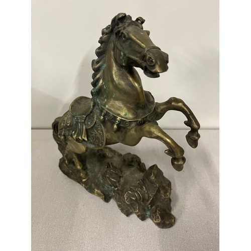 43 - Heavy antique Tibetan silver sculpture of prancing horse. 3.95kg 12