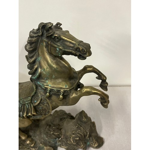 43 - Heavy antique Tibetan silver sculpture of prancing horse. 3.95kg 12