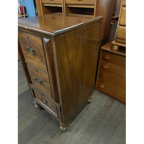 255 - Victorian walnut 3 drawer chest with brass drop handles on metal castor feet