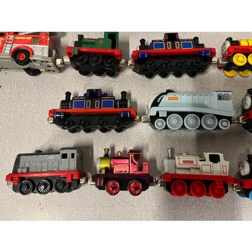 128 - Large collection of diecast thomas the tank engine trains