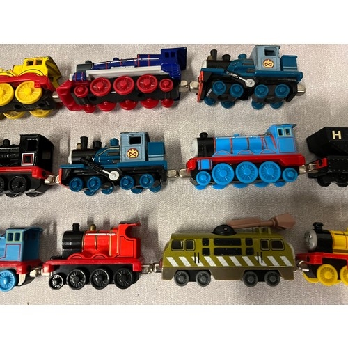 128 - Large collection of diecast thomas the tank engine trains