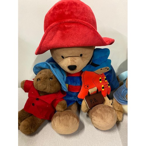 261 - Selection of soft toys to include Peter Rabbit & Paddington bear etc.