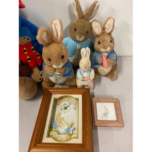 261 - Selection of soft toys to include Peter Rabbit & Paddington bear etc.