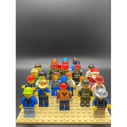 23 - 25 Lego figures to include Santa, fireman, police, miner etc.