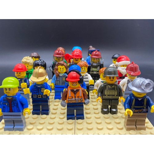 23 - 25 Lego figures to include Santa, fireman, police, miner etc.