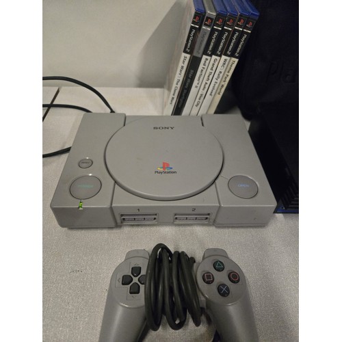 376 - 2 Playstation 1 consoles along with Playstation 2 console, Multiplayer adapter, 2 controllers, Plays... 