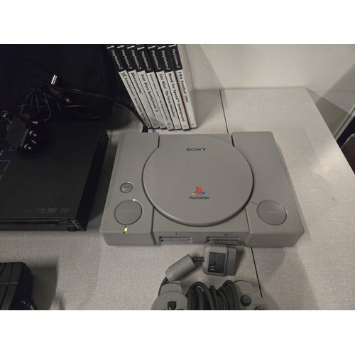 376 - 2 Playstation 1 consoles along with Playstation 2 console, Multiplayer adapter, 2 controllers, Plays... 