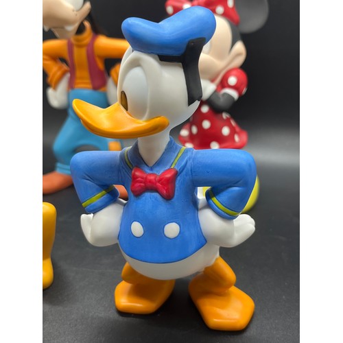 129 - 4 Large Disney ceramic figurines to include Donald Duck & Goofy etc.  Tallest 7