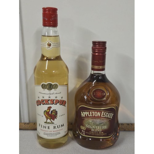 73 - 2 Full & sealed bottles of rum to include Appleton estate signature blend 40% along with Cockspur fi... 