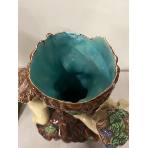 599 - Majolica spill vase with cherubs, 2 doulton miniature vase along with composite eagle