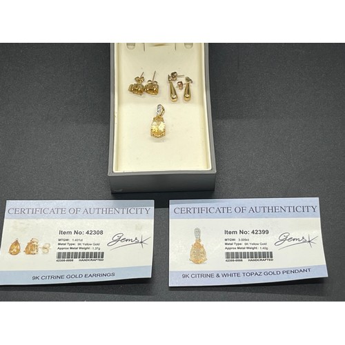 5A - 9k yellow gold citrine earrings along with 9k citrine & topaz pendant & 9k drop earrings.
4.54 grams