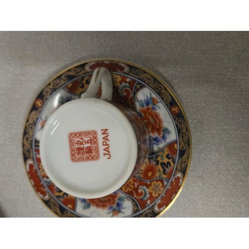 615 - 15 Piece Japanese imari peacock coffee set.