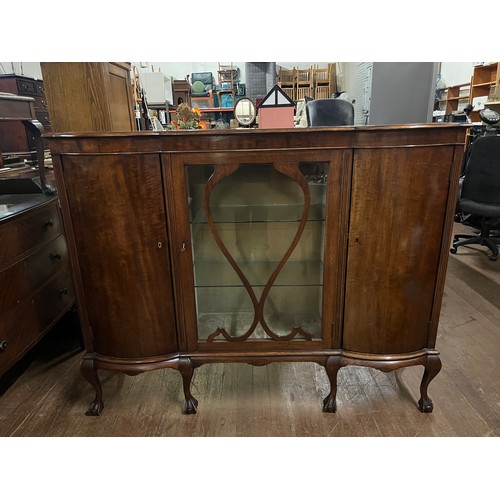 148 - Antique bow fronted 3 door display cabinet on ball claw feet, all doors open. 60