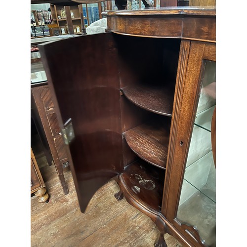 148 - Antique bow fronted 3 door display cabinet on ball claw feet, all doors open. 60