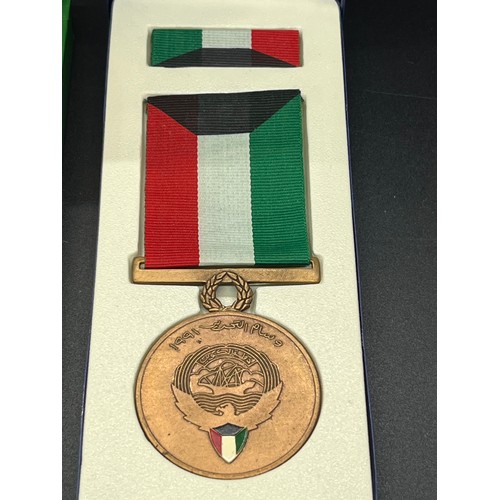 2 - 2 x Saudi Arabia Kuwait liberation medals in fitted leather case.