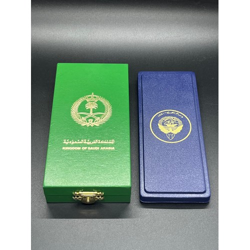 2 - 2 x Saudi Arabia Kuwait liberation medals in fitted leather case.