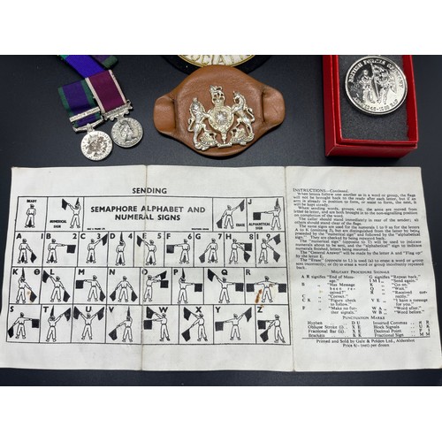 7 - Selection of military  items to include WWII warrant officers arm band, gulf veterans badge and Brit... 