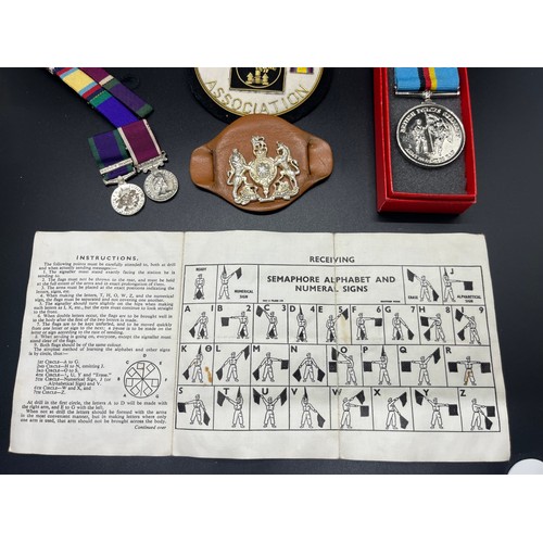 7 - Selection of military  items to include WWII warrant officers arm band, gulf veterans badge and Brit... 