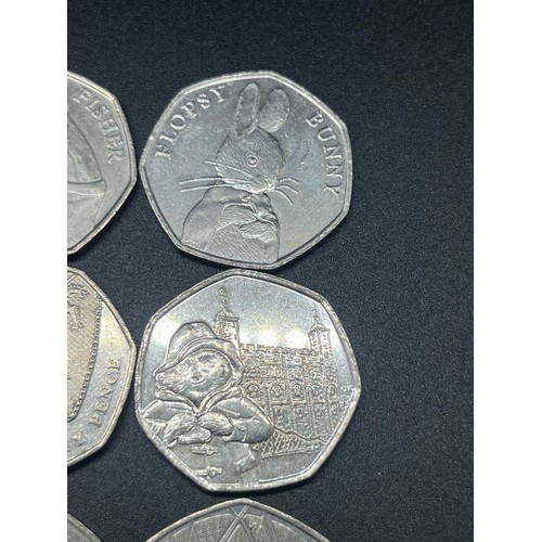 107 - Collection of 40 50 pence coins to include Benjamin Bunny, Tom Kitten, Squirrel Nutkin and Paddingto... 