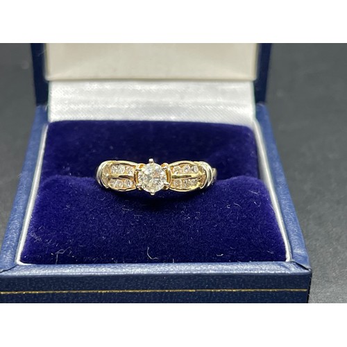 16 - 14 ct gold & diamond ladies ring approx. over 0.5ct or over