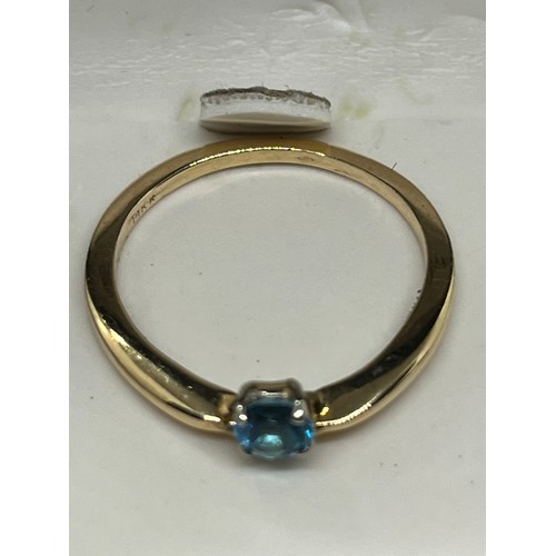 20 - 14kt gold & topaz ladies ring