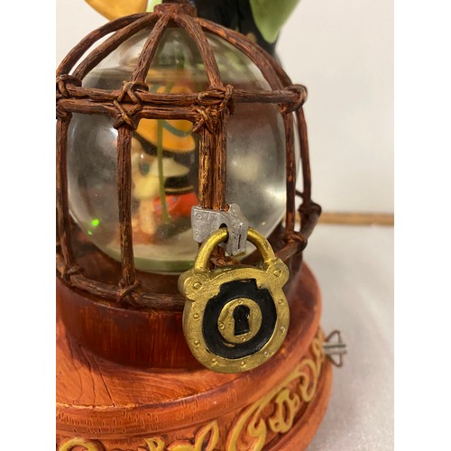 95 - Large Disney store Pinocchio & Stromboli snow globe. 8.5