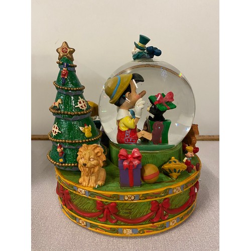 120 - Disney Store Pinocchio musical snow globe new with box. 8