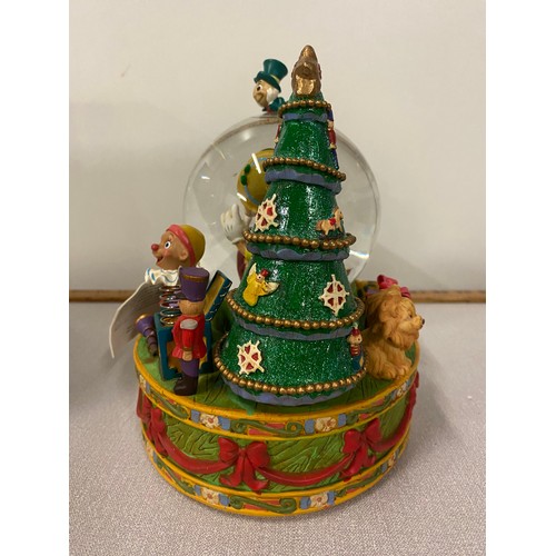 120 - Disney Store Pinocchio musical snow globe new with box. 8