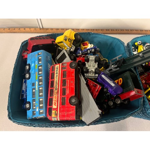 216 - 2 baskets full of playworn vehicles to include matchbox , corgi etc