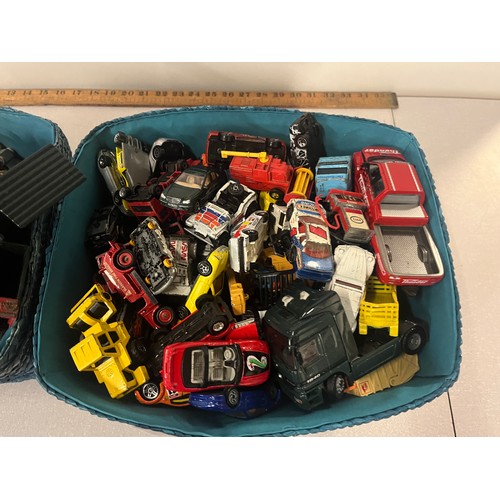 216 - 2 baskets full of playworn vehicles to include matchbox , corgi etc