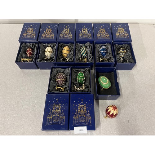 164 - 10 Atlas editions Faberge style decorative eggs with stands. (8 boxed)