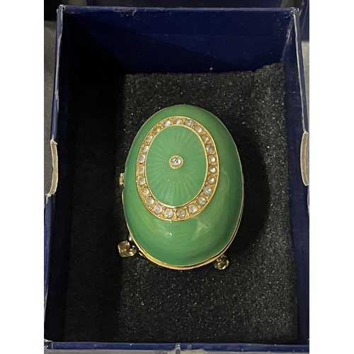 164 - 10 Atlas editions Faberge style decorative eggs with stands. (8 boxed)