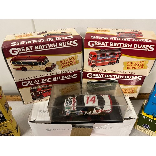 230 - Selection of boxed diecast trams & busses to include pin badge, clock etc along with Terry Labonte K... 