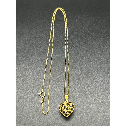 174 - 18kt gold heart pendant on a 14kt gold chain
2.06 grams