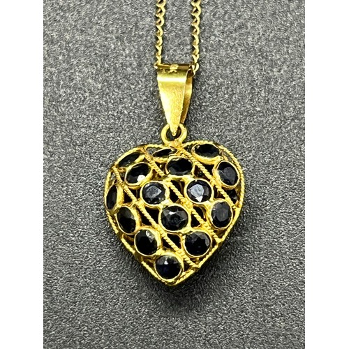 174 - 18kt gold heart pendant on a 14kt gold chain
2.06 grams