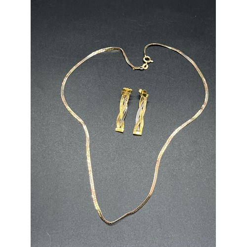 176 - 14kt gold chain 2.92 grams,along with along with 18kt gold earings 2.62 grams