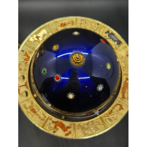 54 - Vintage musical Zodiac celestial globe cigarette holder along with matching windmill lighter.