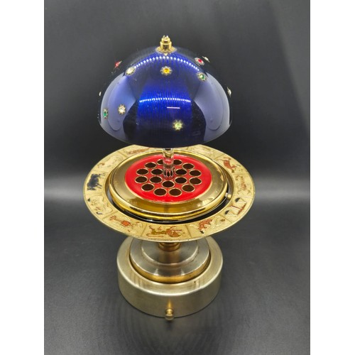 54 - Vintage musical Zodiac celestial globe cigarette holder along with matching windmill lighter.