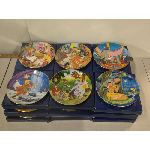 267 - 18 Boxed Disney Classics collector plates exclusively for Kenley's all with display stands.